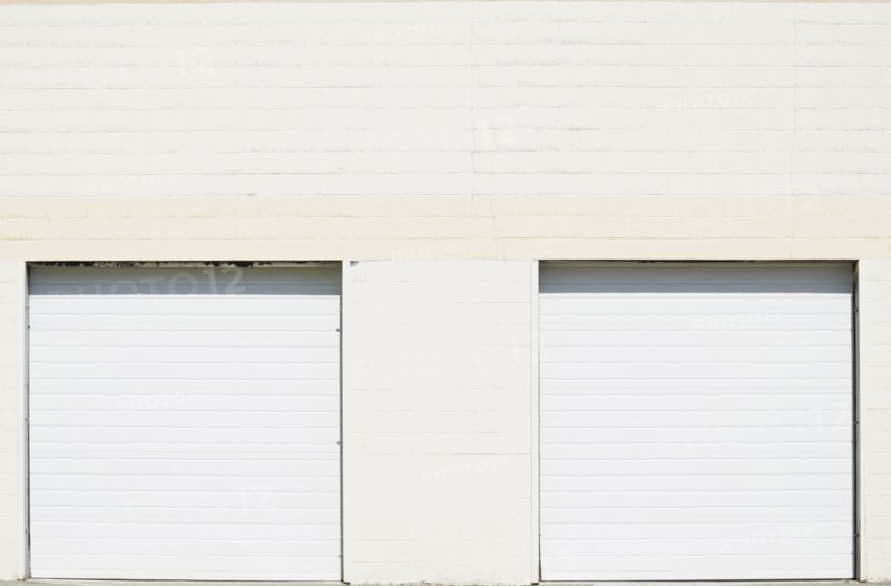 Close-up shot of closed roller doors of warehouse
