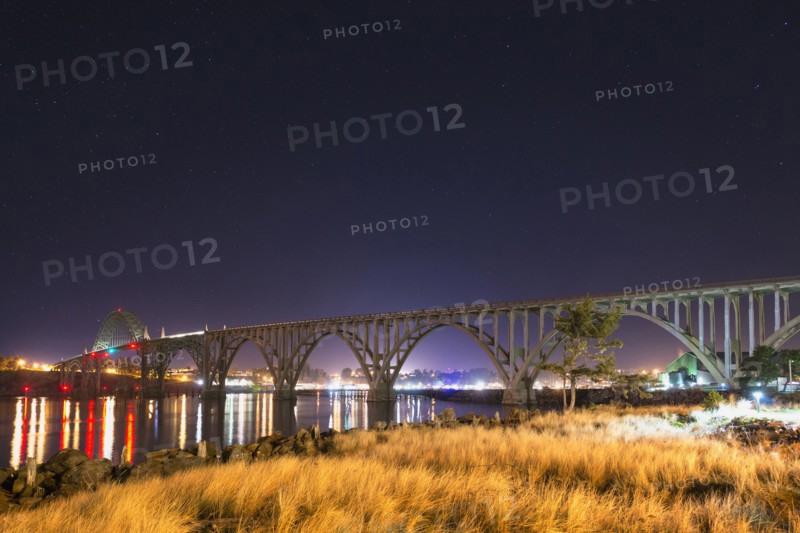 View of arch bridge at night