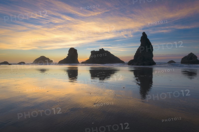 Beach with stack rocks at sunset
