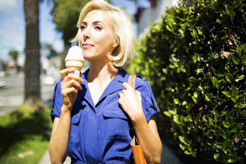 Woman walking with ice-cream
