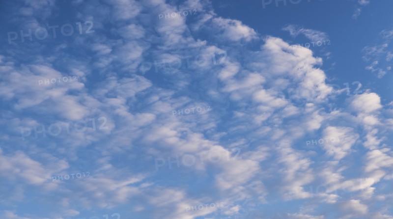 White clouds on blue sky.