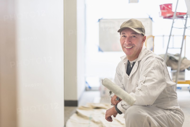 Portrait of smiling manual worker.