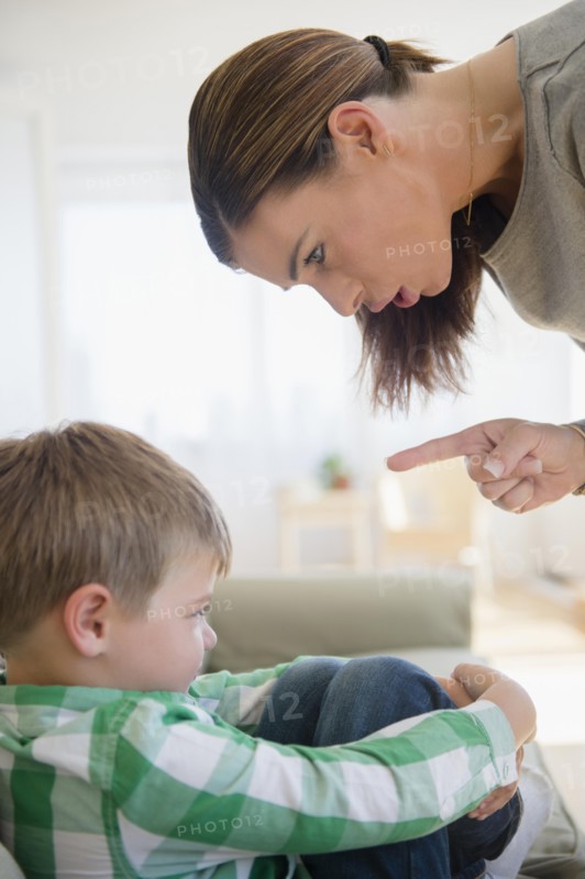 Mother giving lecture to son (6-7)