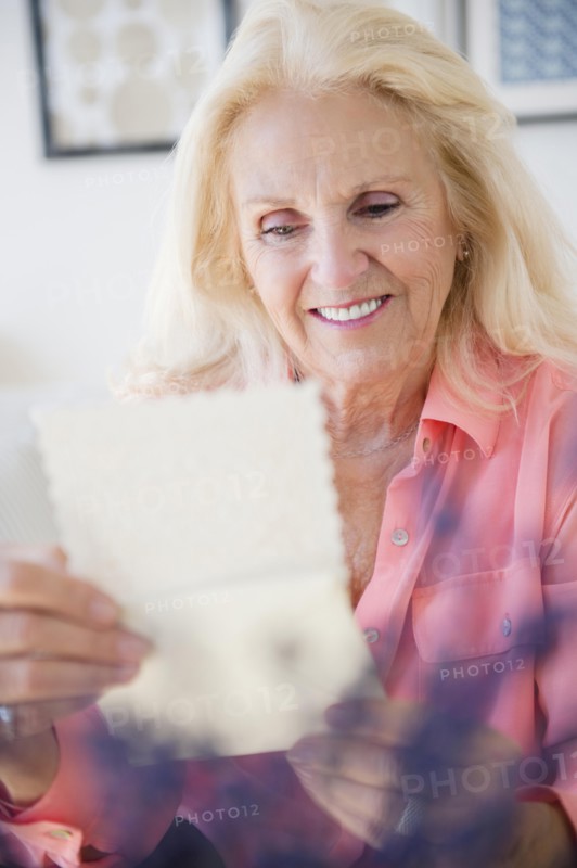 Senior woman reading letter
