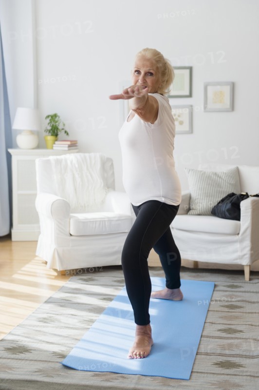 Portrait of senior woman doing yoga