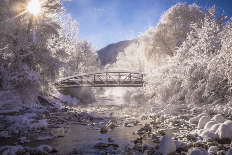 Scenic view of stream in winter