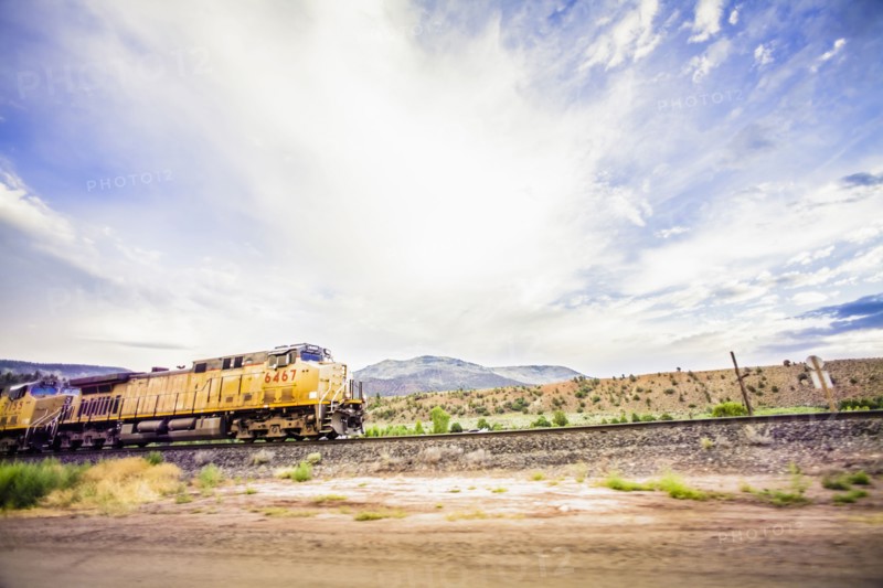Train on railroad tracks in countryside