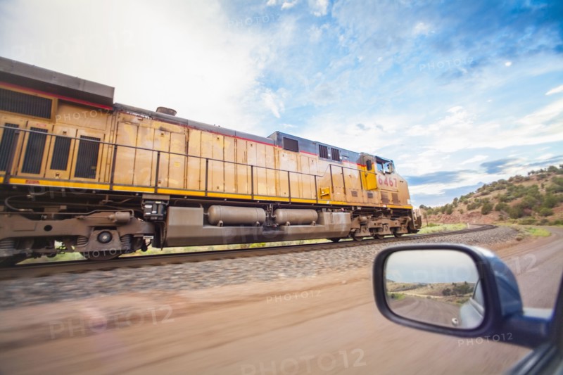 Train on railroad tracks in countryside