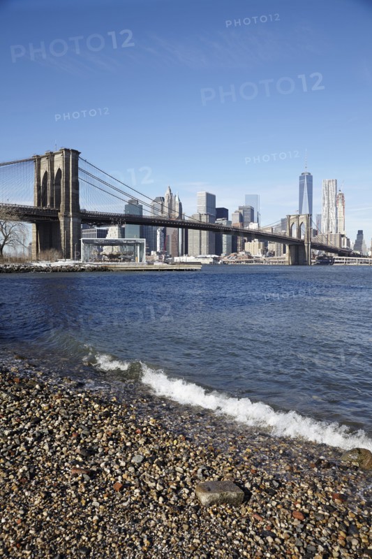 View of suspension bridge and cityscape