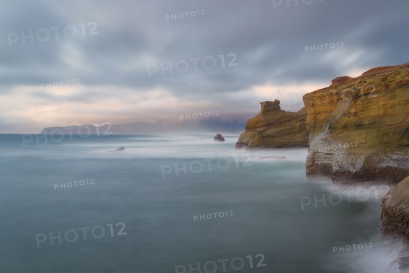 Scenic view of cliffs along coastline