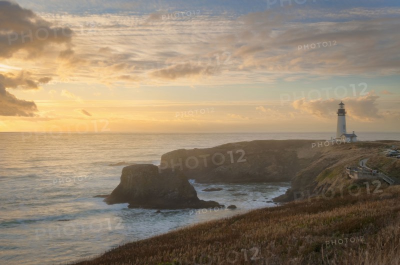 Scenic view of lighthouse at sunset