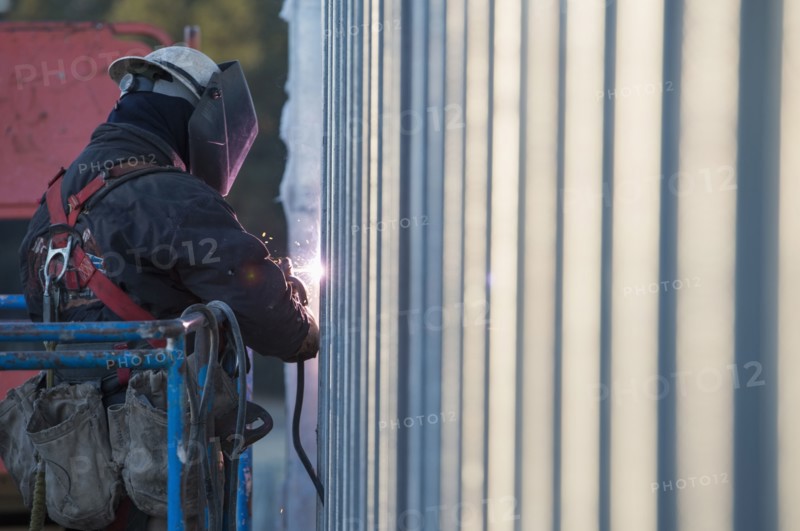 Man welding steel bar