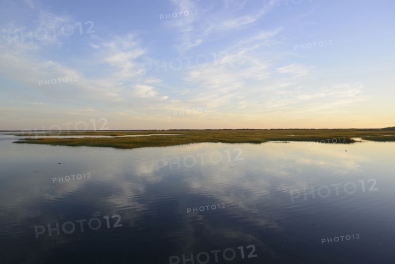 Sky reflecting in still bay