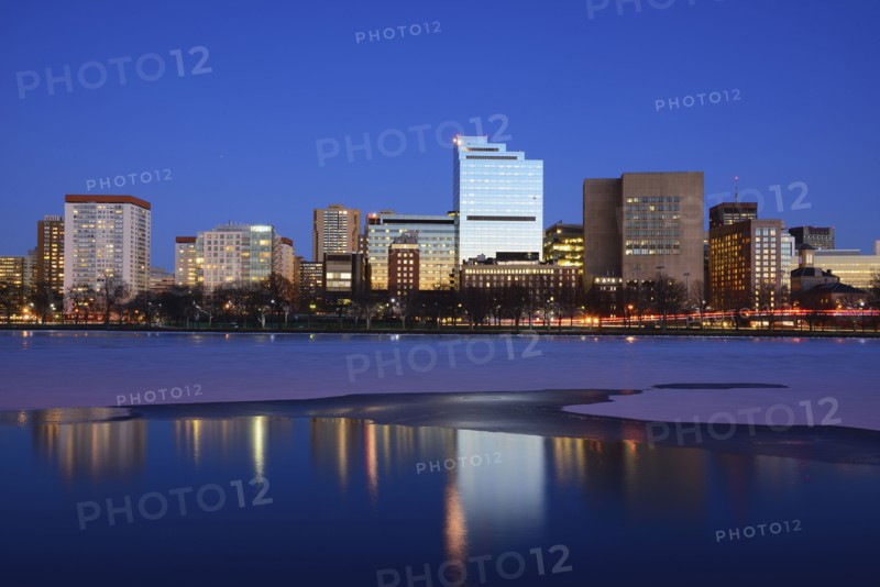 Waterfront at dusk, reflection in water
