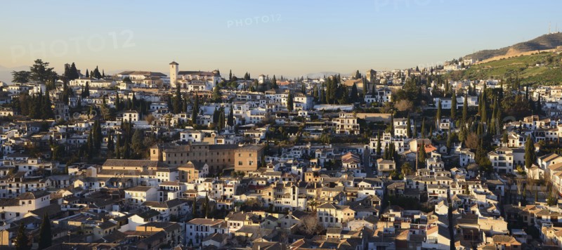 Townscape and hill in sunlight
