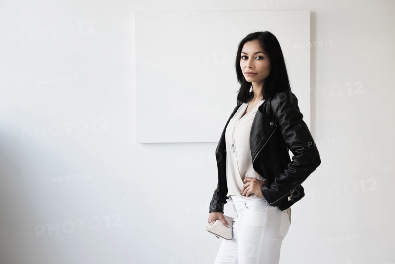 Portrait of young woman in studio.