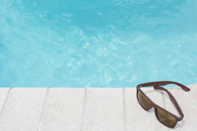 Sunglasses on pool side