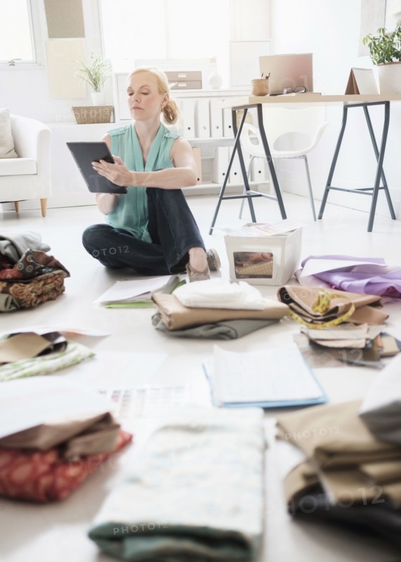 Fashion designer working in studio.