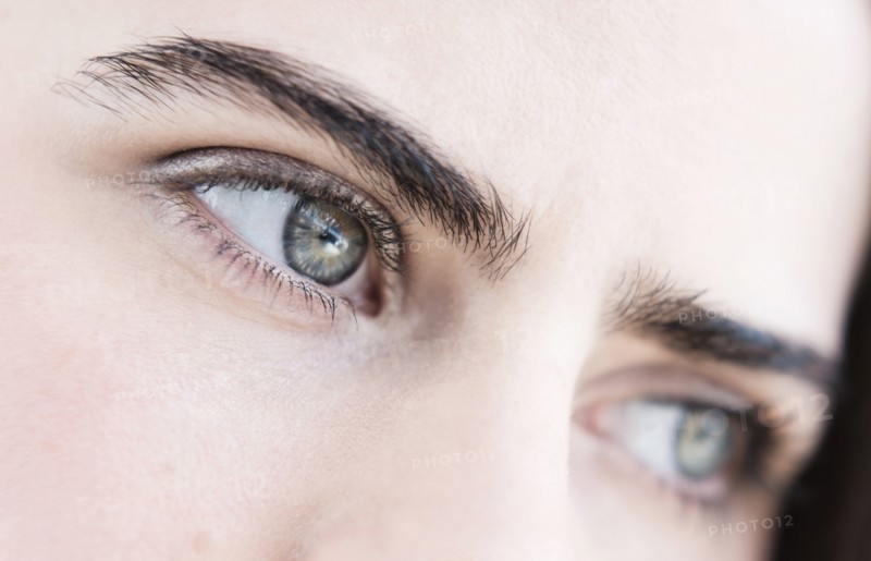 Portrait of young woman with blue eyes.