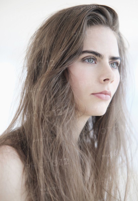Portrait of young woman with blue eyes.