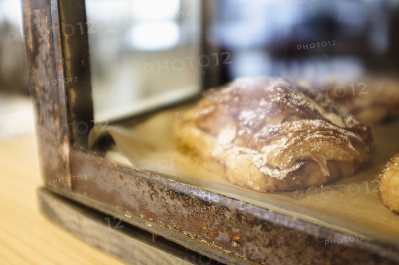 Close-up of croissant in bakery.