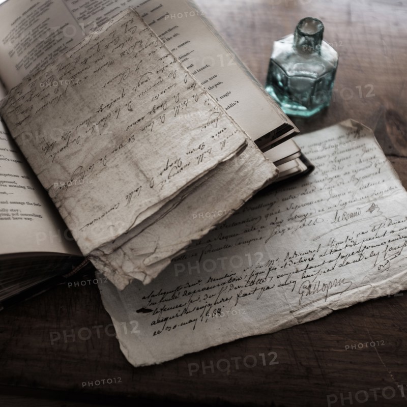 Old letters and inkwell.