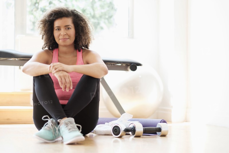 Portrait of young woman at gym.