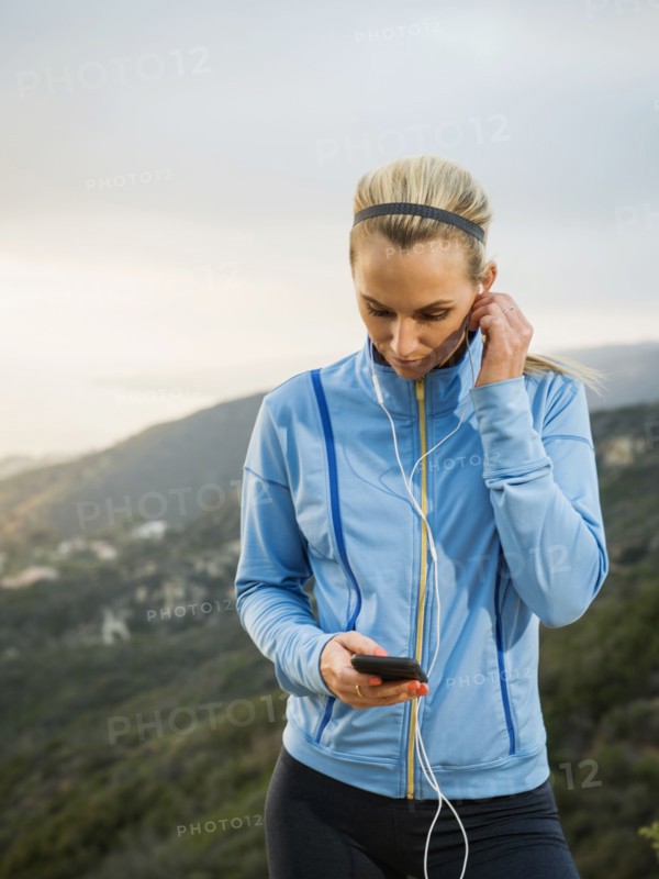 Woman checking smart phone