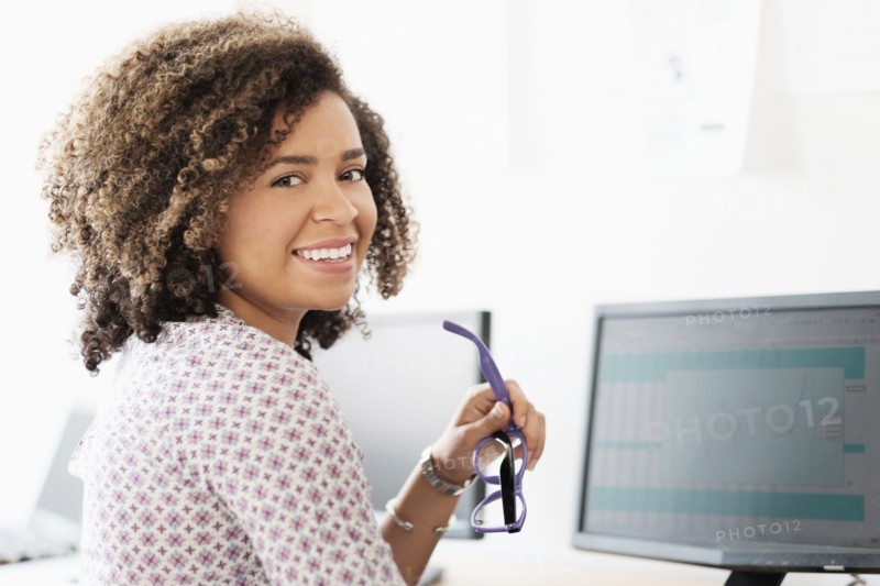 Young woman working at office.