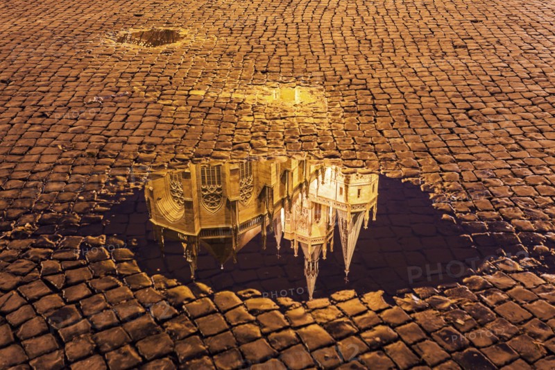 Reflection of Erfurt Cathedral in puddle
