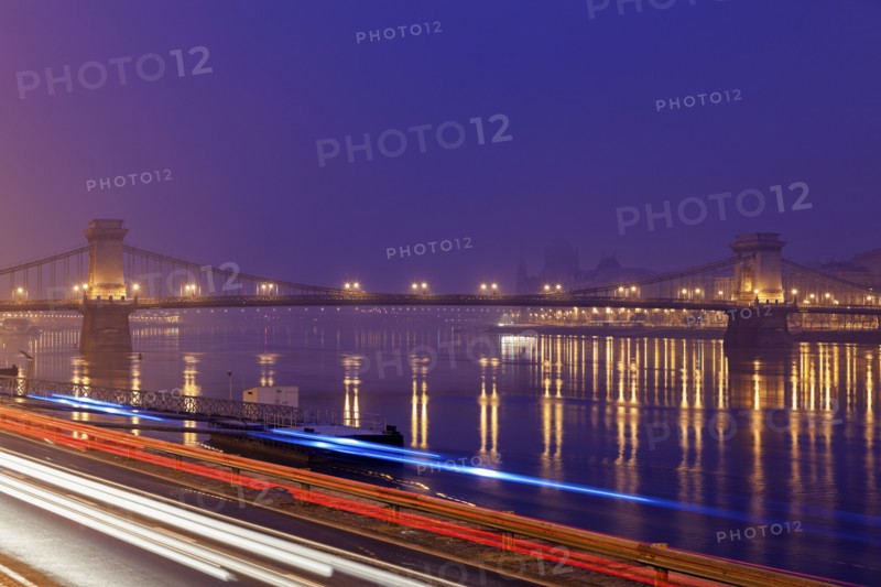 Illuminated Chain Bridge and light trails