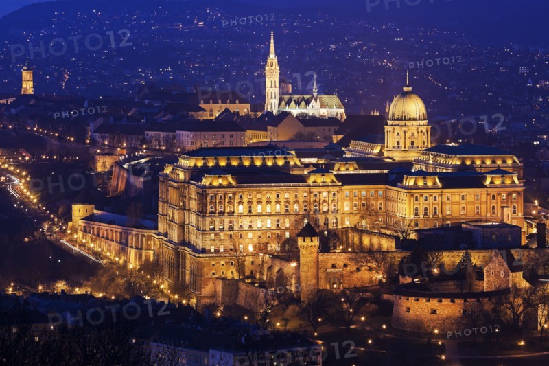 Cityscape with illuminated Royal Palace and Matthias Church