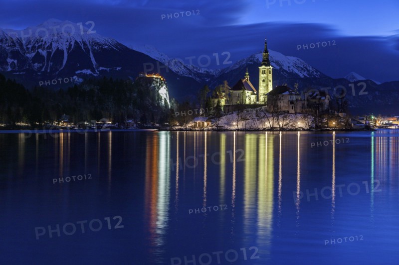 Lake Bled and illuminated Church of the Assumption
