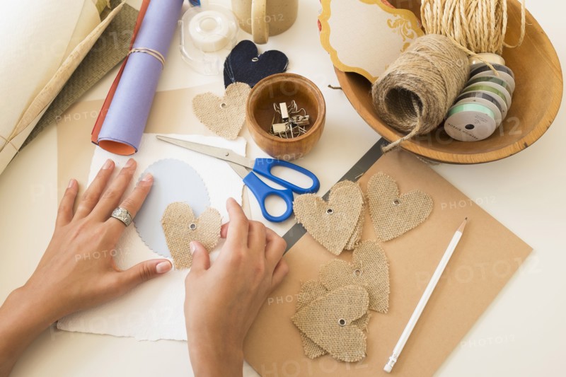 Crafts equipment on table.