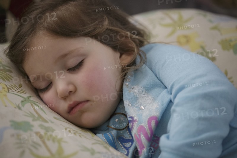Girl sleeping in bed