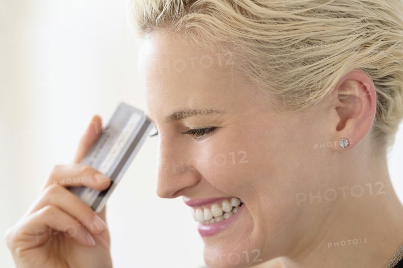 Young woman spending money.