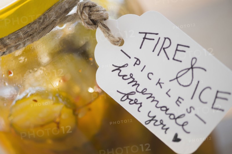 Jar with spicy pickles and hand written tag