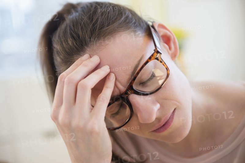 Portrait of tired woman
