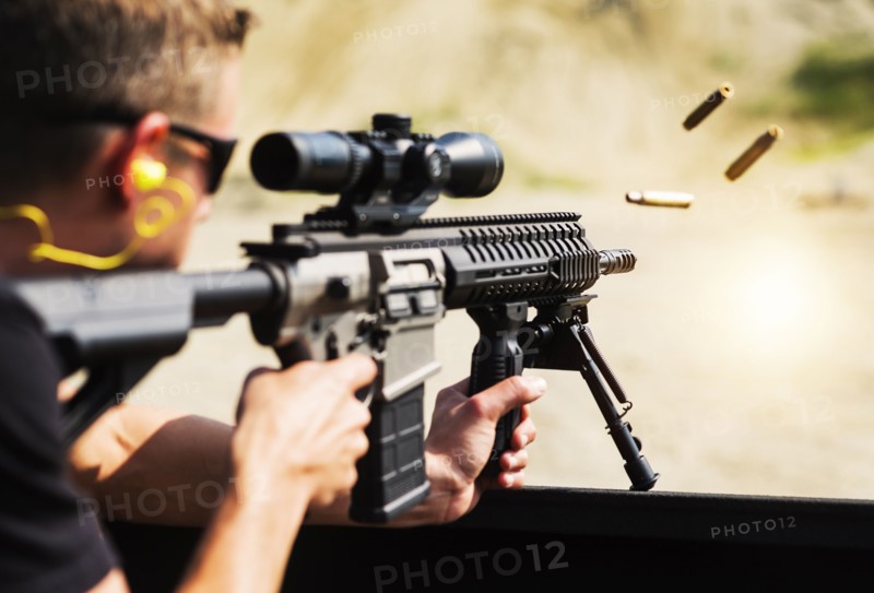 Man shooting rife