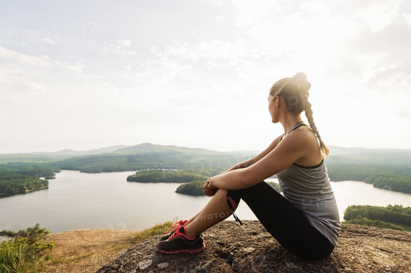 Young female hiker looking at view