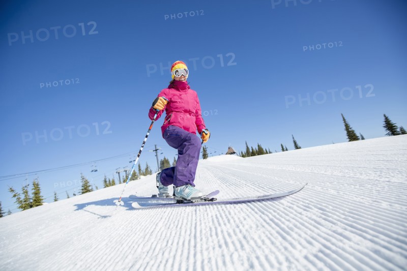 Woman skiing downhill