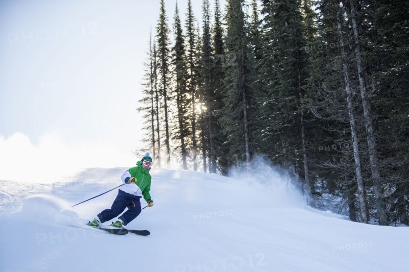 Man skiing downhill