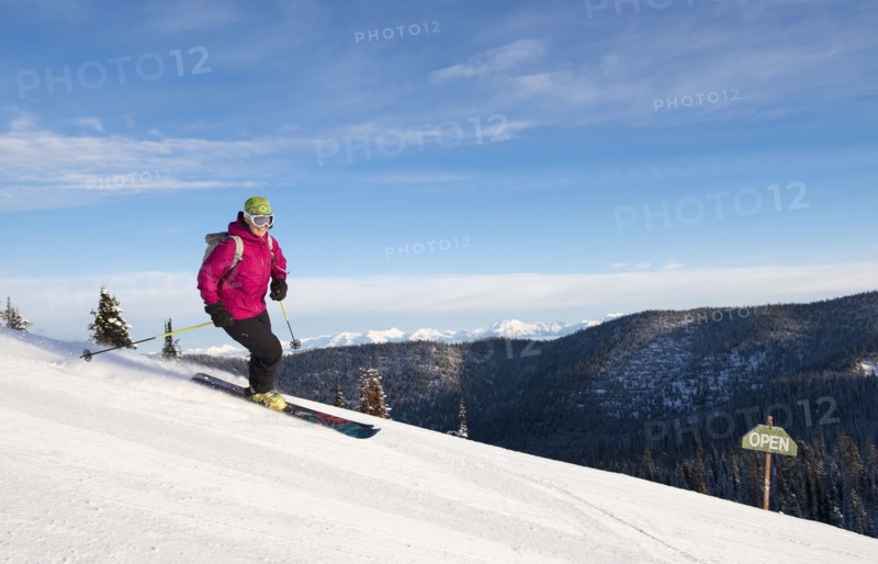 Woman skiing downhill
