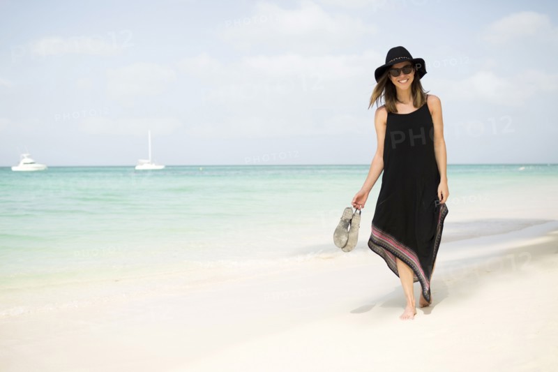 Woman walking on beach