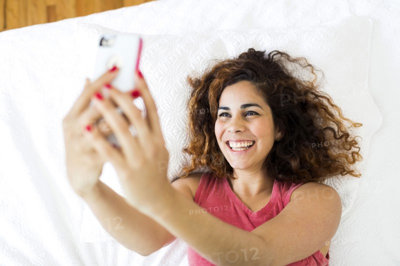 Woman holding smart phone