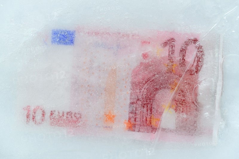 Studio Shot of 10 euro bill frozen in ice