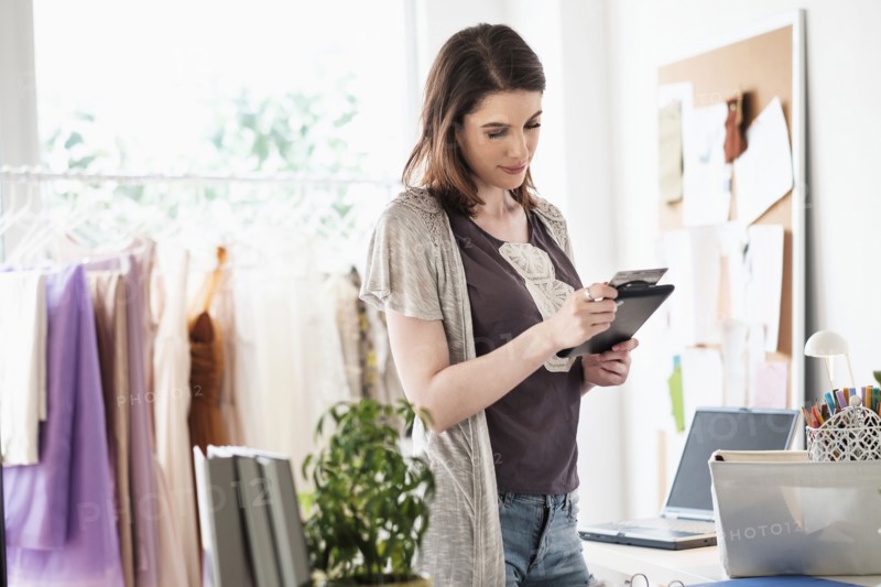 Female fashion designer in her office.