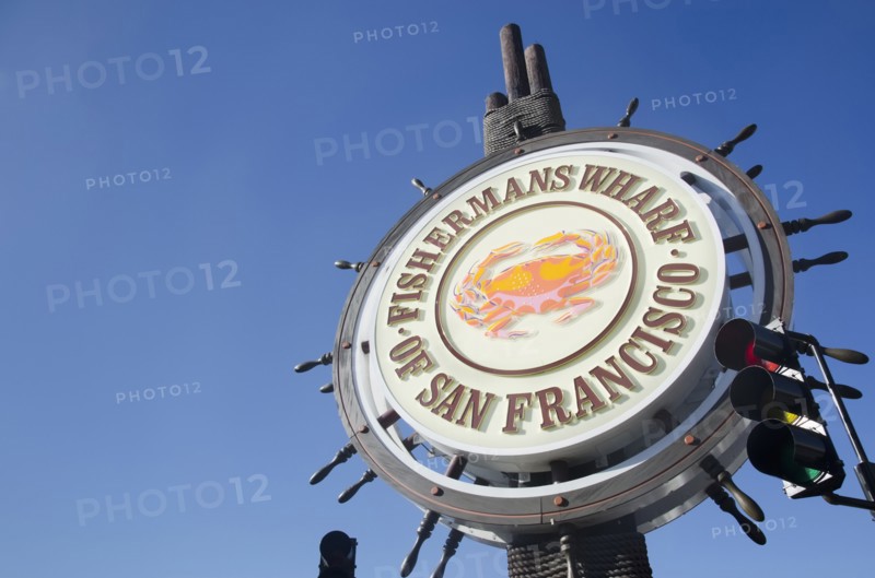 Commercial sign against clear sky