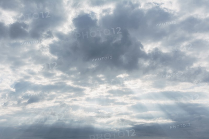 Scenic cloudscape with sunbeams