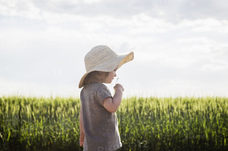 Portrait of girl in straw hat